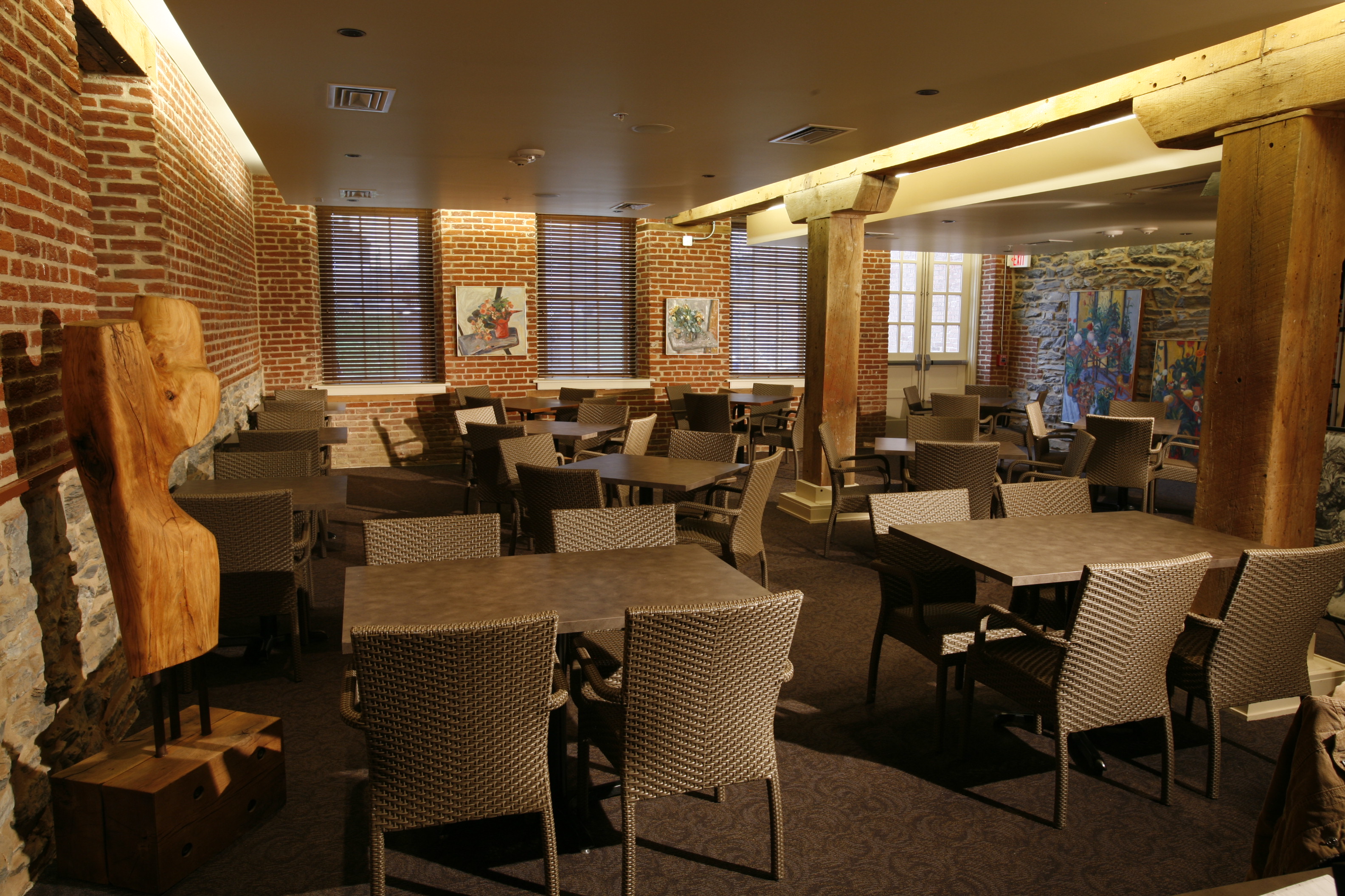 a room with tables and chairs