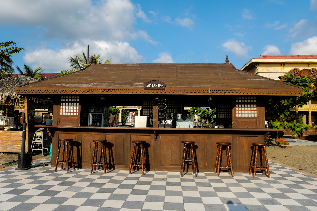 a bar with stools outside