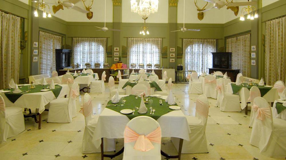 a room with tables and chairs