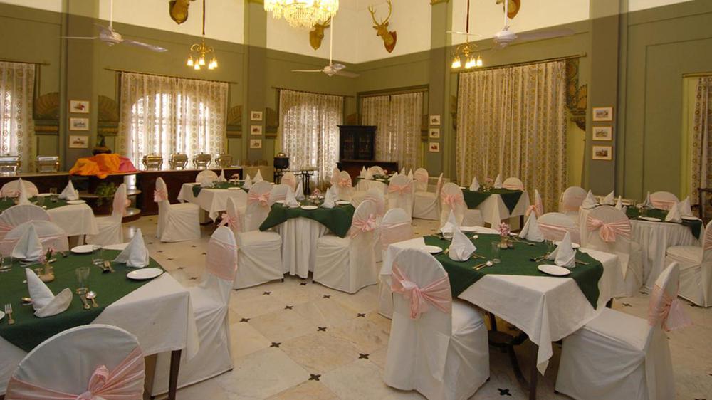 a room with tables and chairs