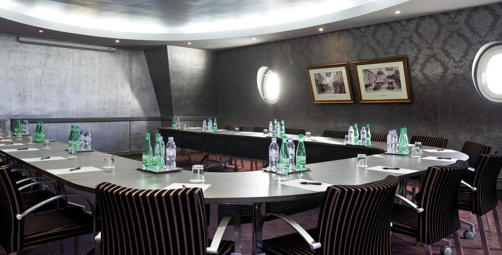 a room with a table and chairs