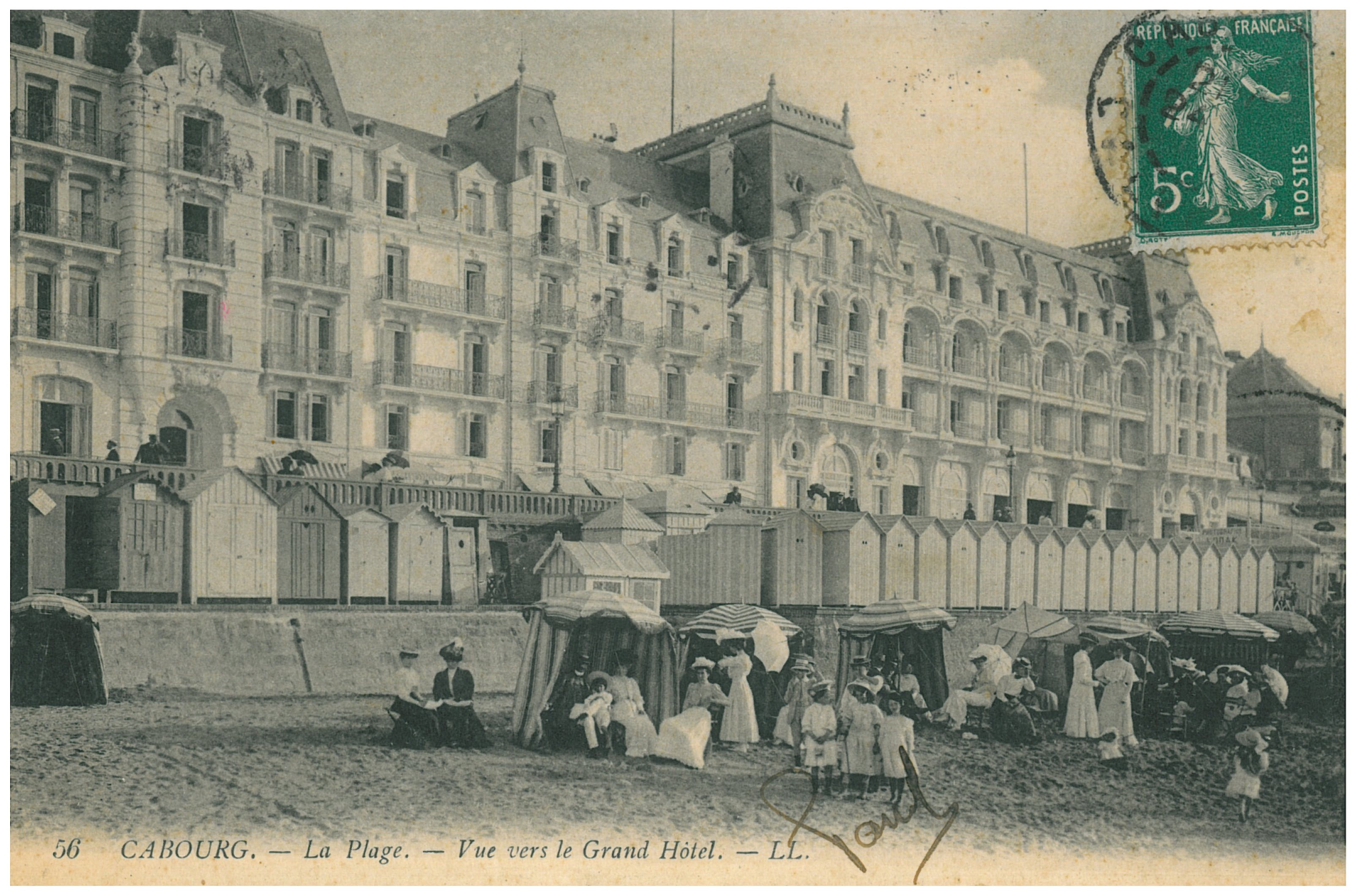 a group of people outside a hotel