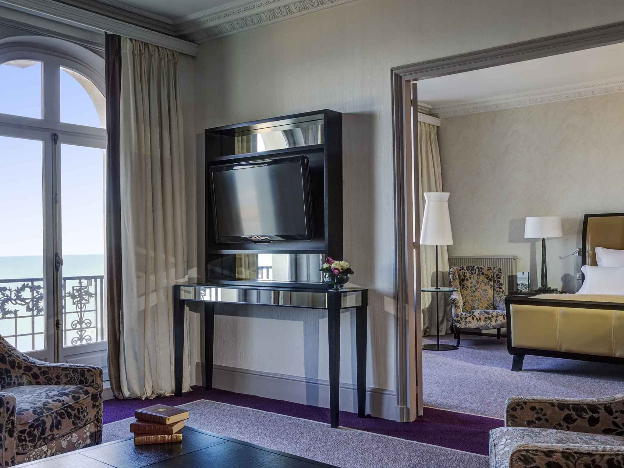 a room with a television and a table
