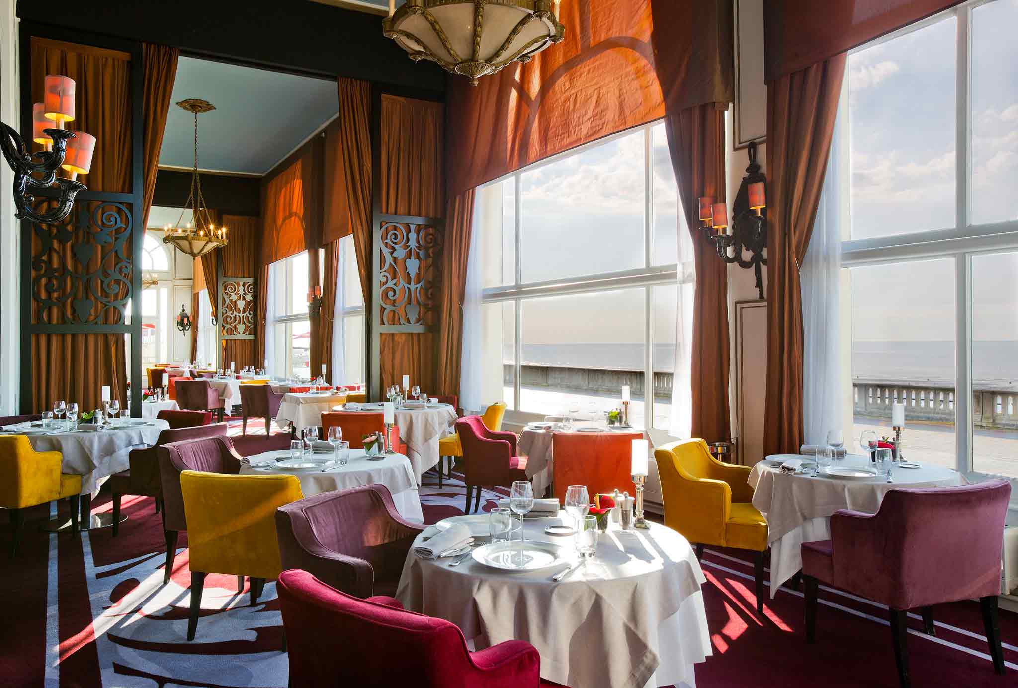 a room with tables and chairs