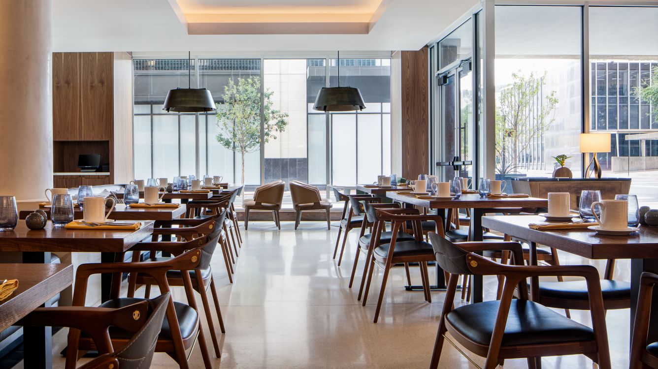 a room with tables and chairs