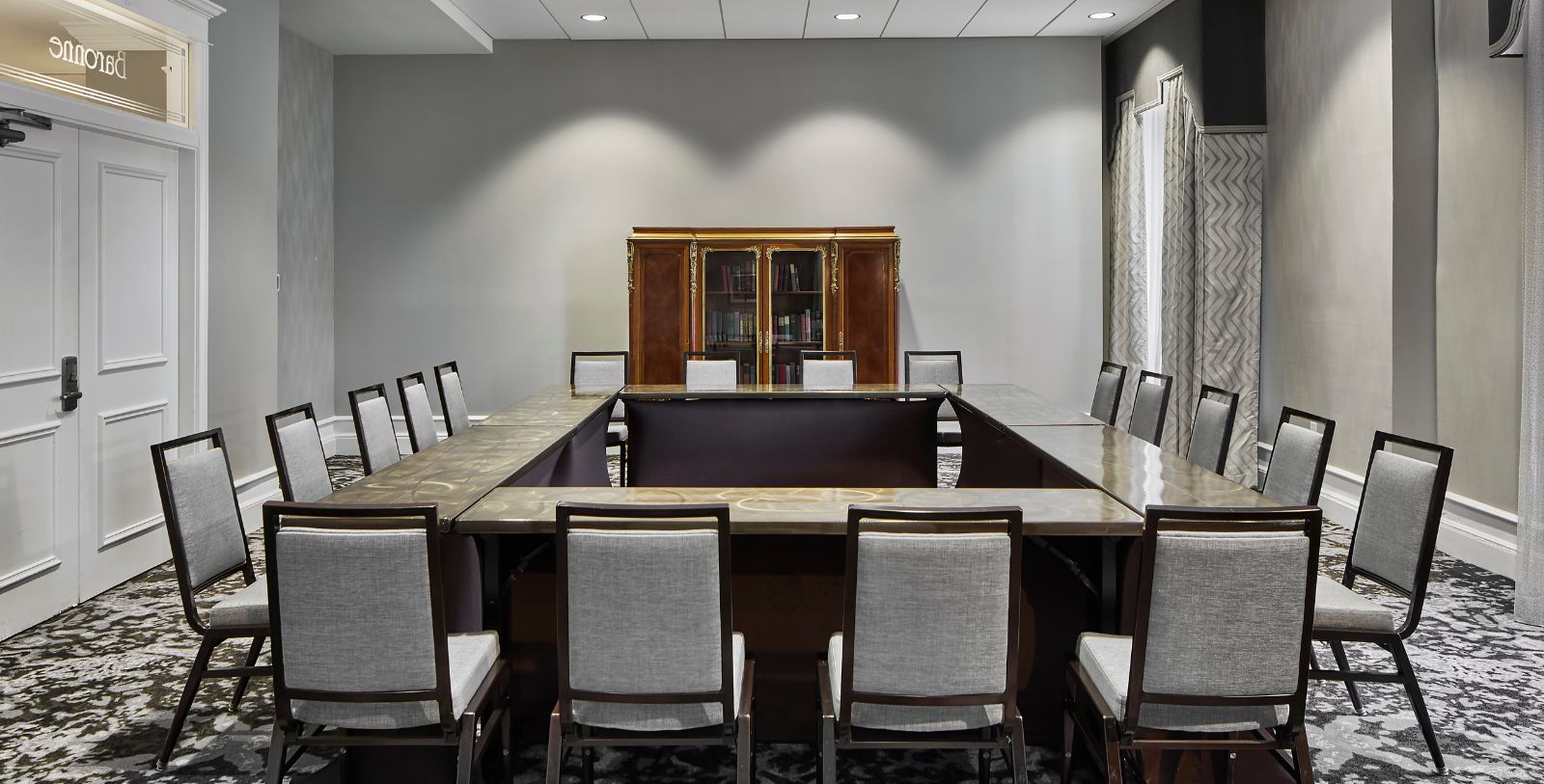 a room with a table and chairs