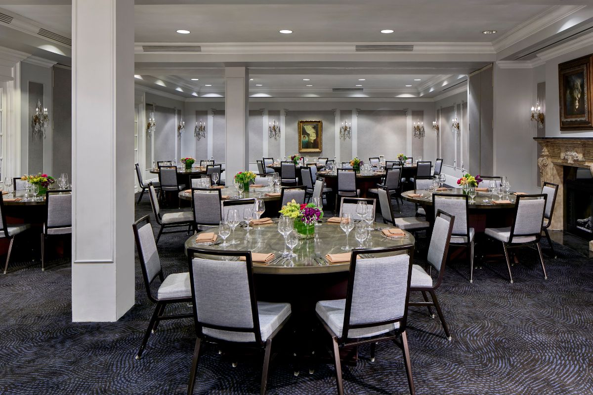 a room with tables and chairs