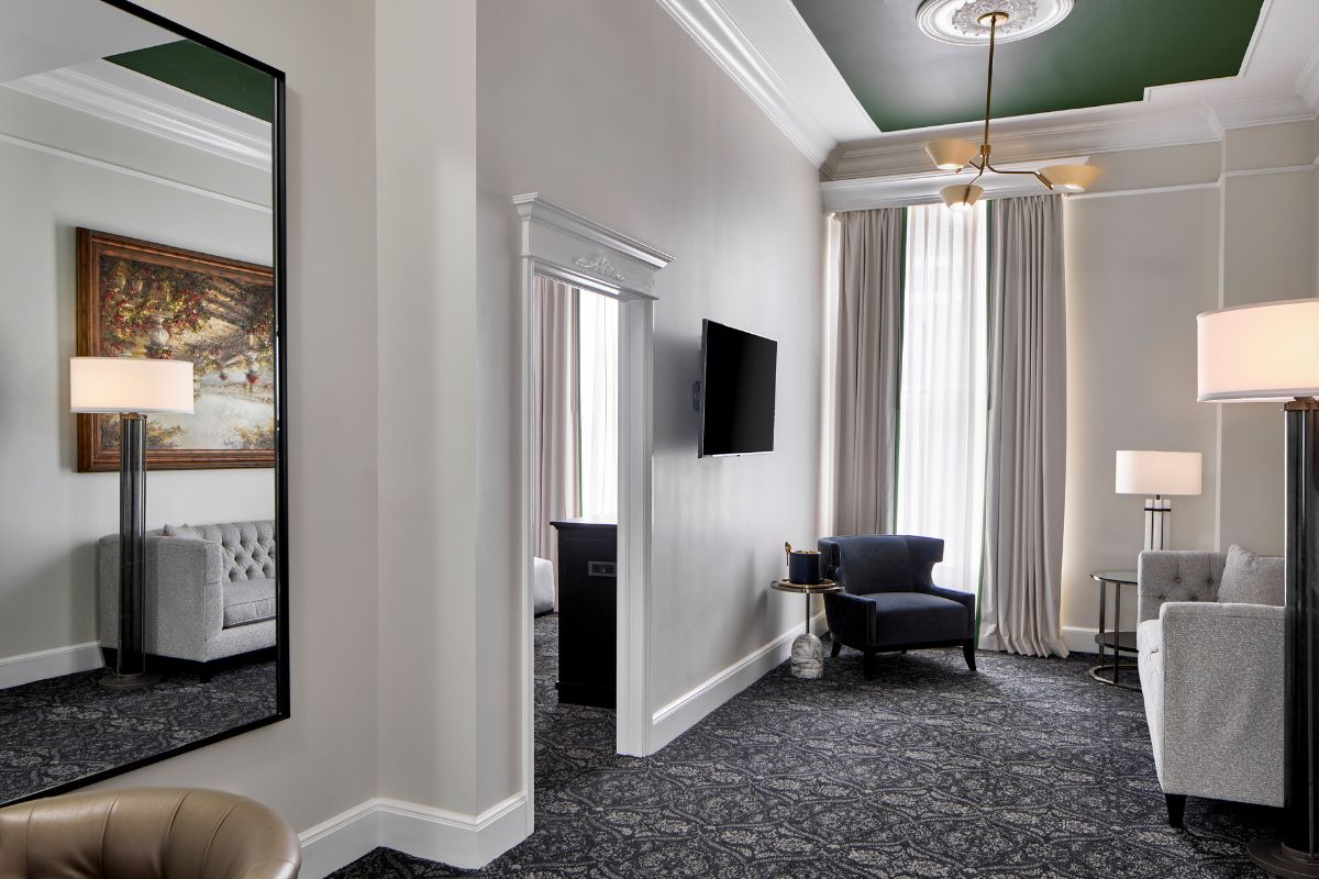 a room with a tv and a chair