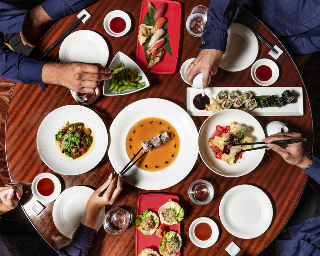 a group of people eating at a table