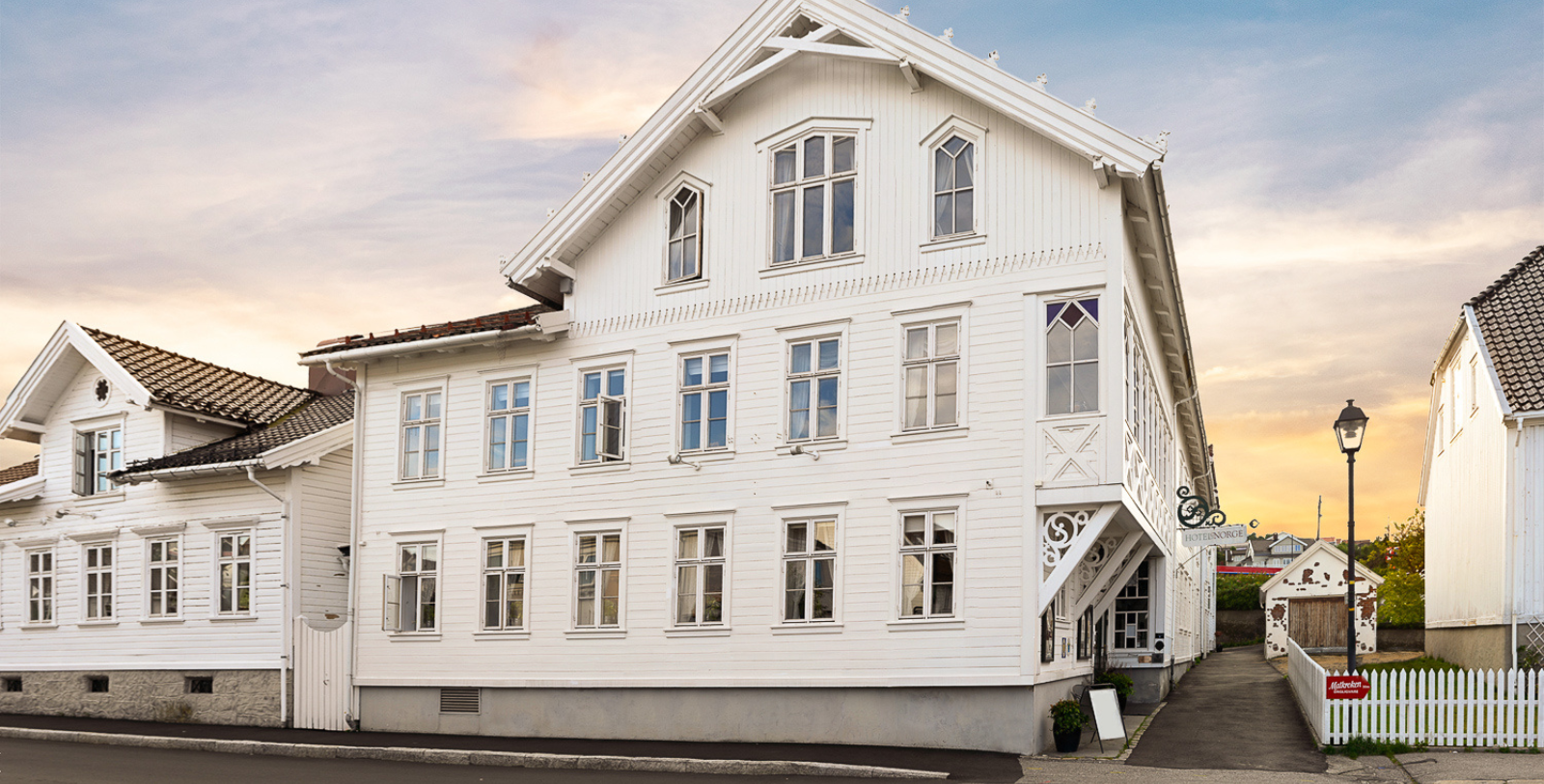 a white building with a balcony