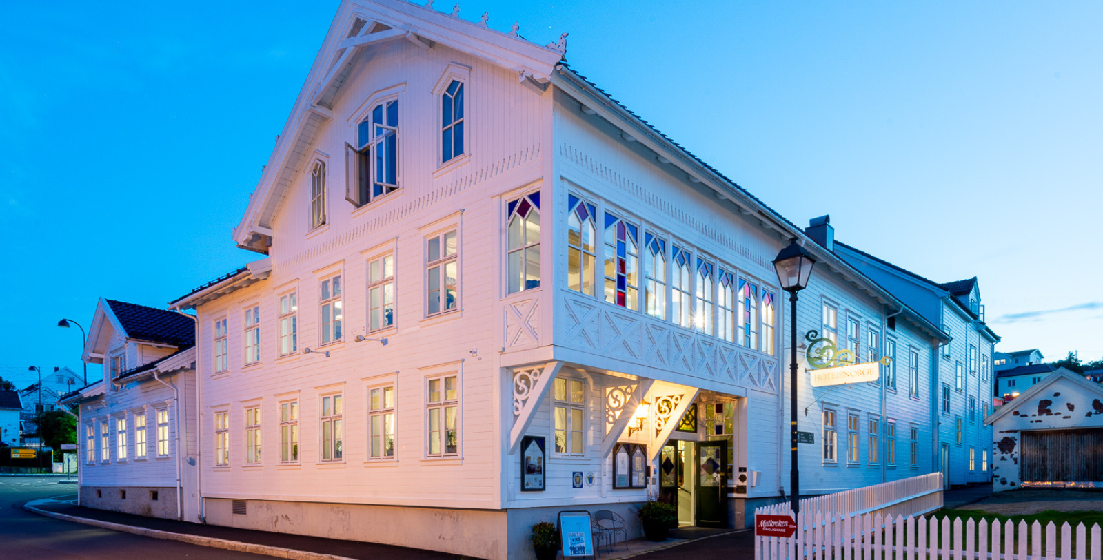 a white building with a sign