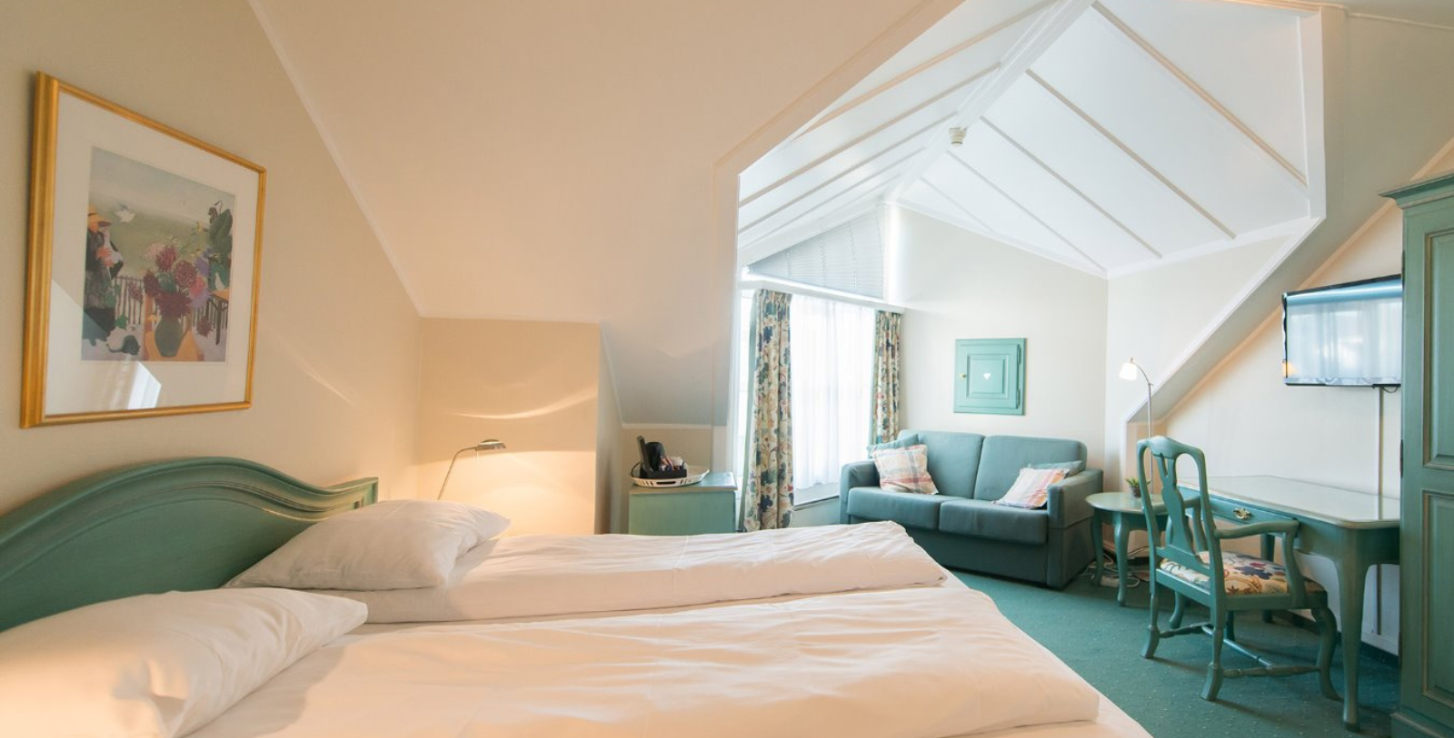 a room with a bed and a couch