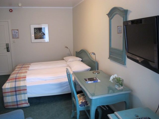a room with a bed and a table