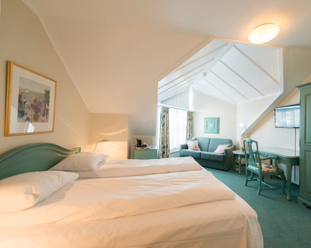 a room with a bed and a couch