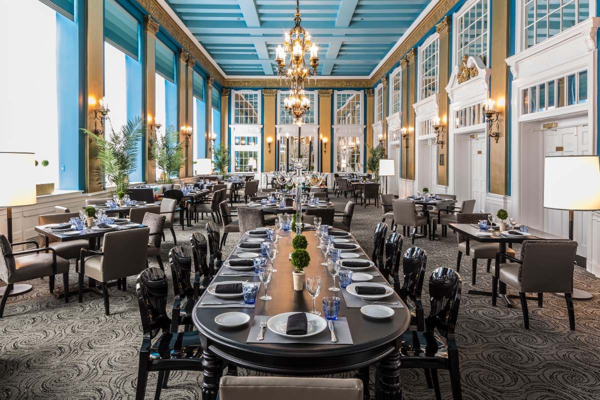 a large room with tables and chairs