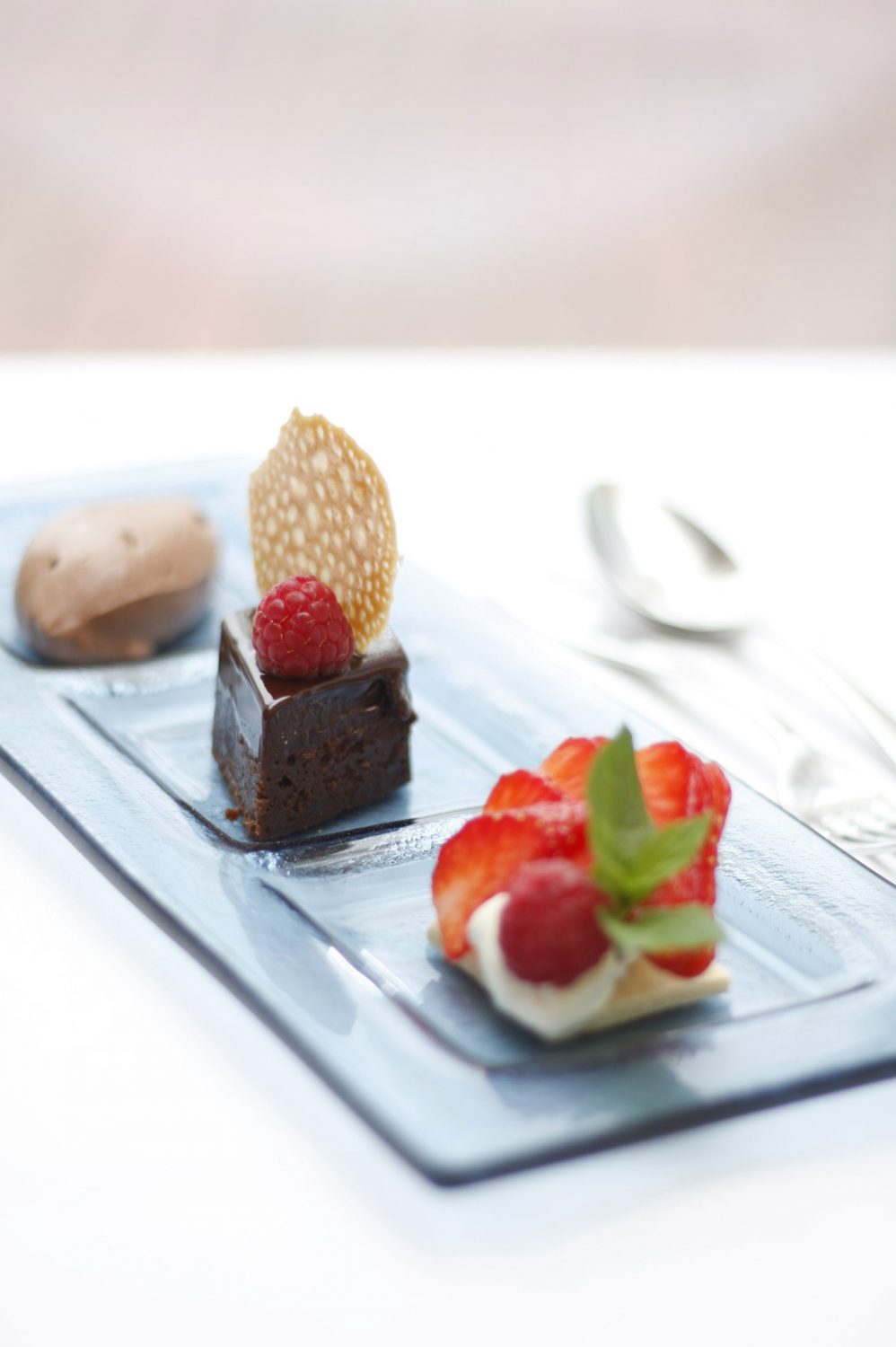 a plate of desserts on a table