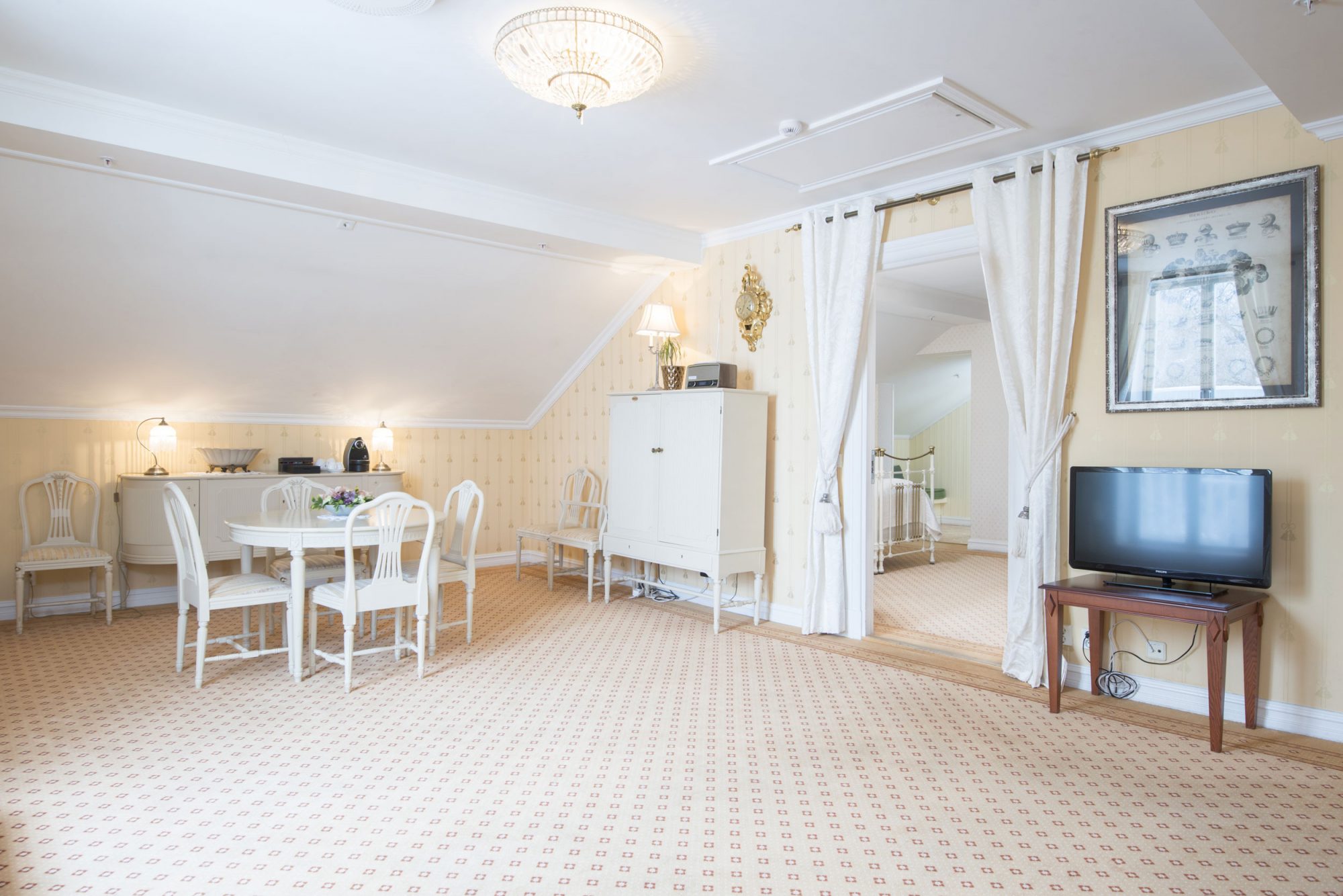 a room with a television and a table