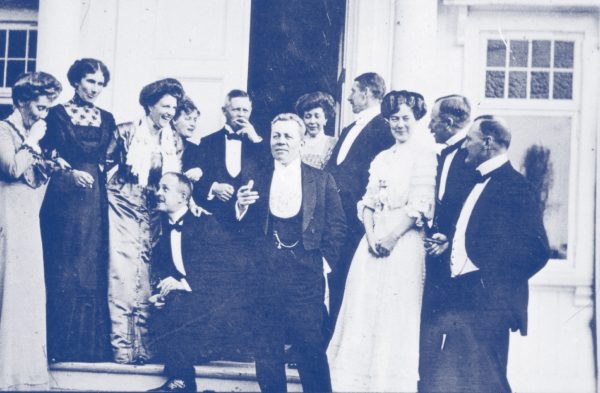 a group of people standing outside a building