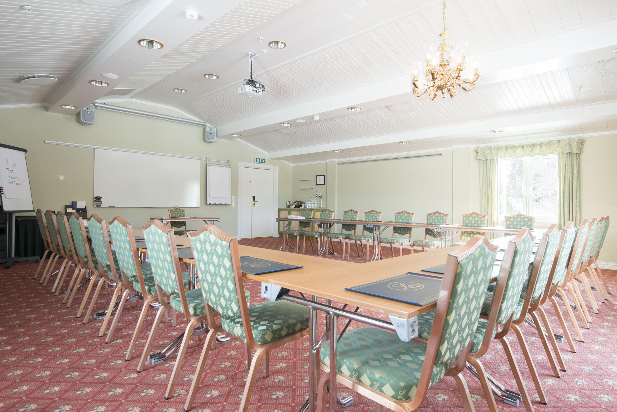 a room with a table and chairs