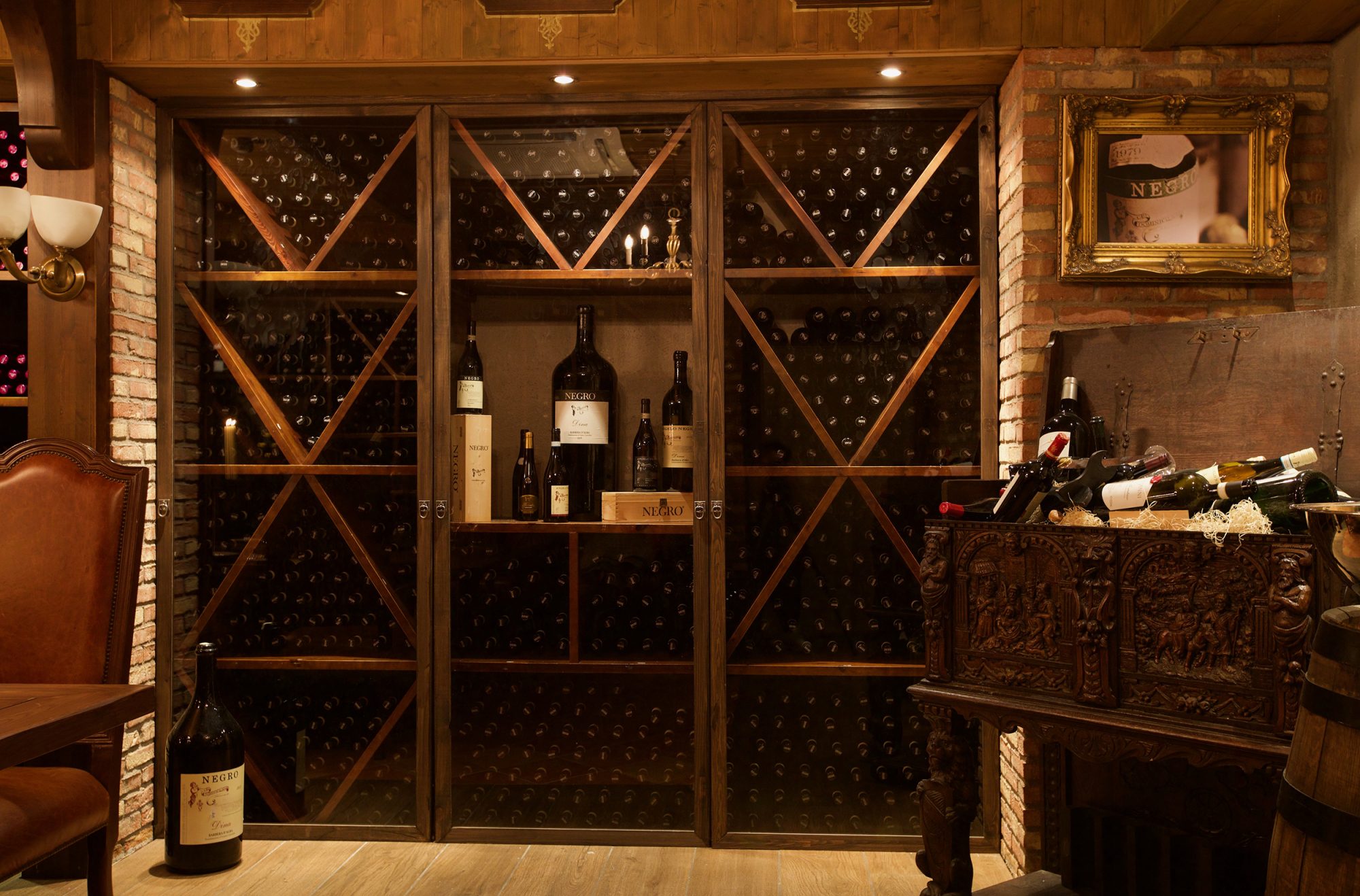 a wine cellar with wine bottles and a piano