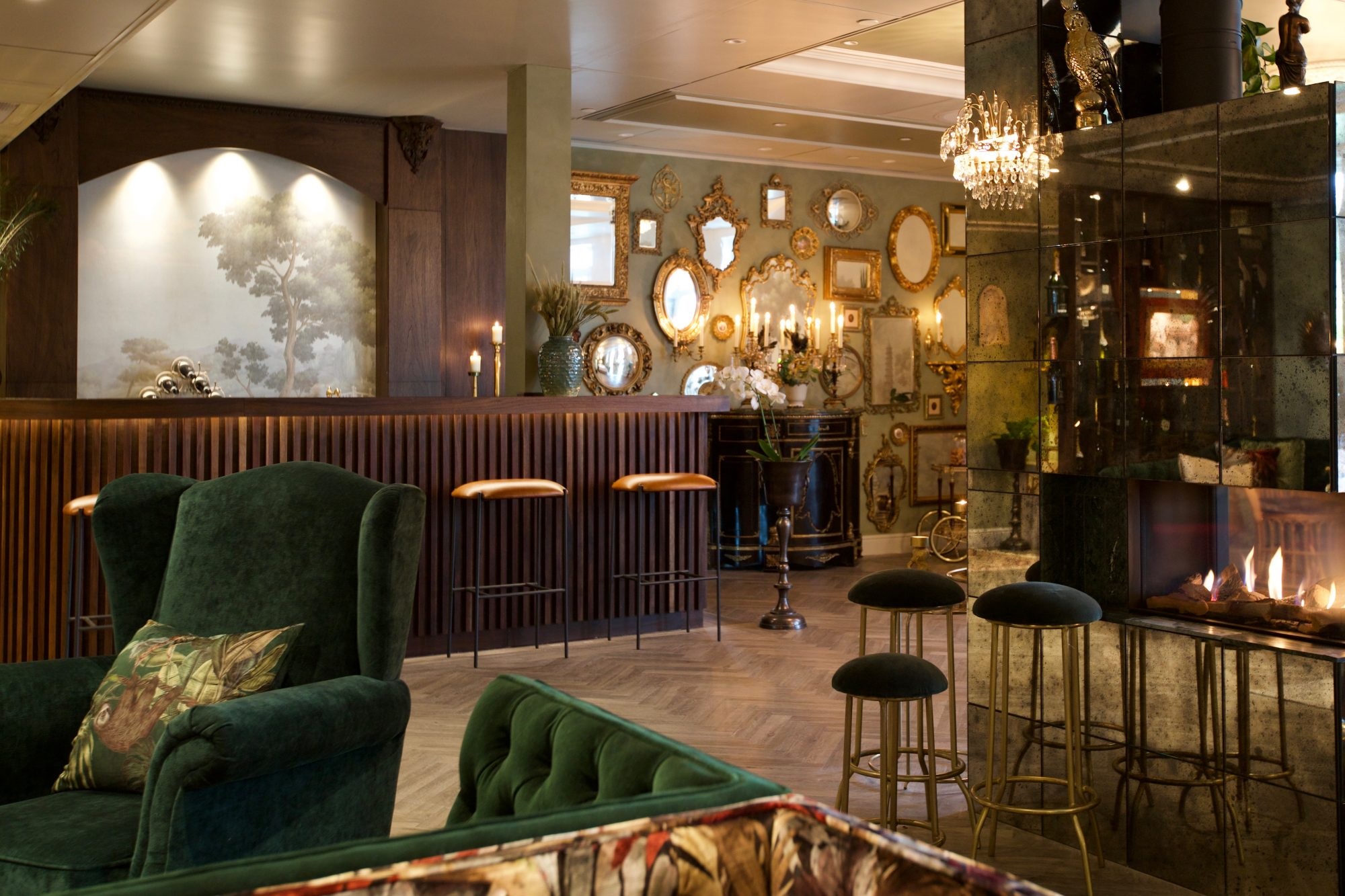 a room with a bar and a mirror wall