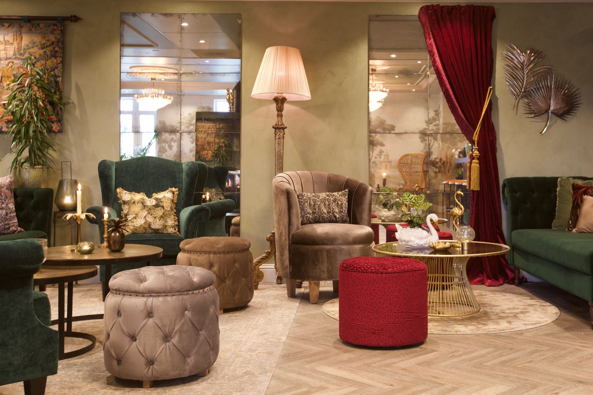 a room with a large mirror and chairs