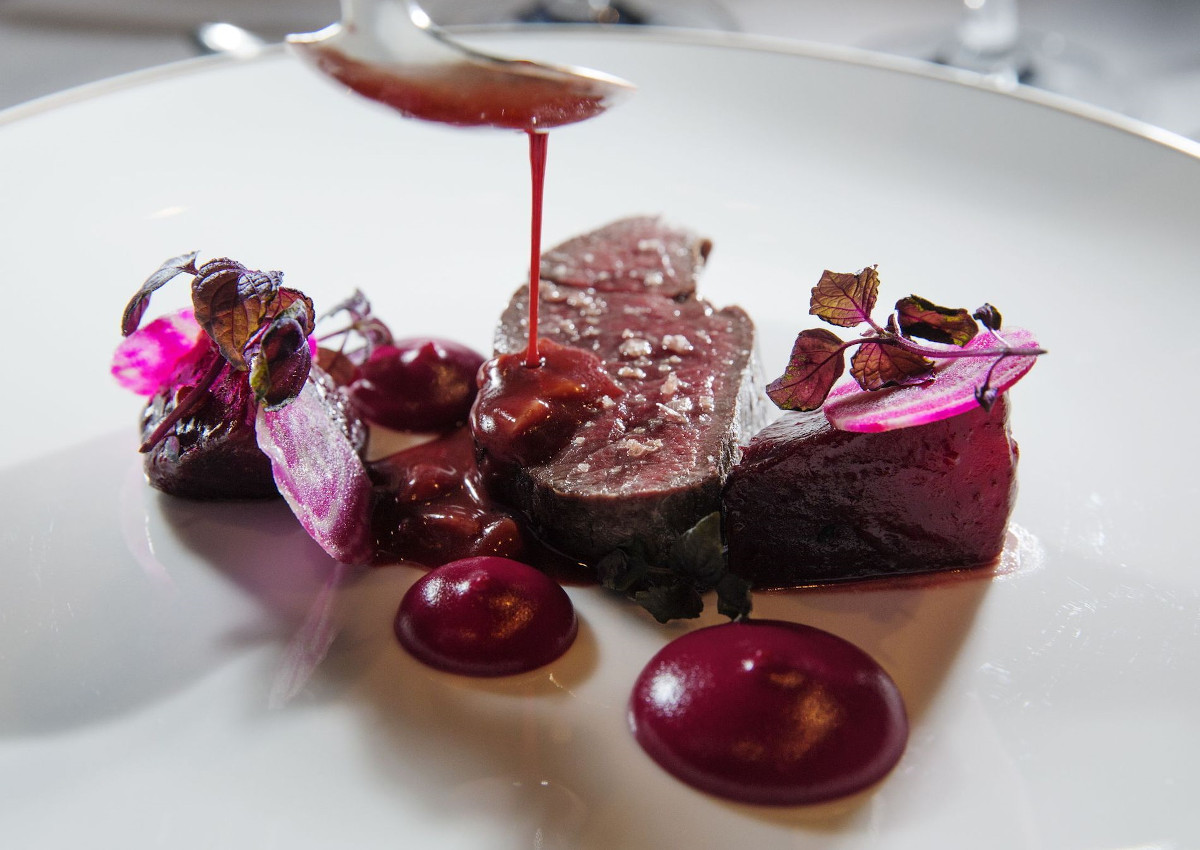 a plate of food with sauce