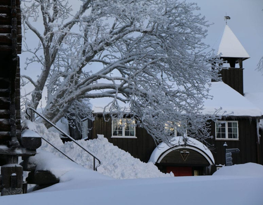 a building with snow on the ground