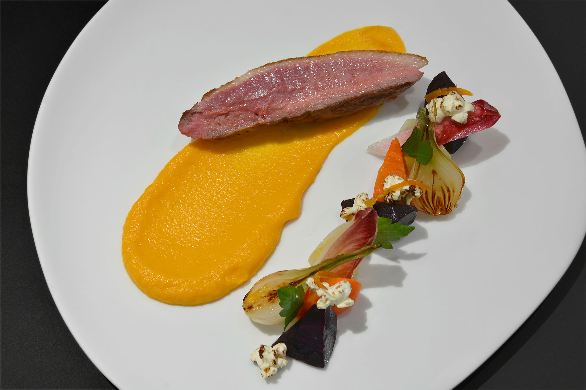 a plate of food on a white plate