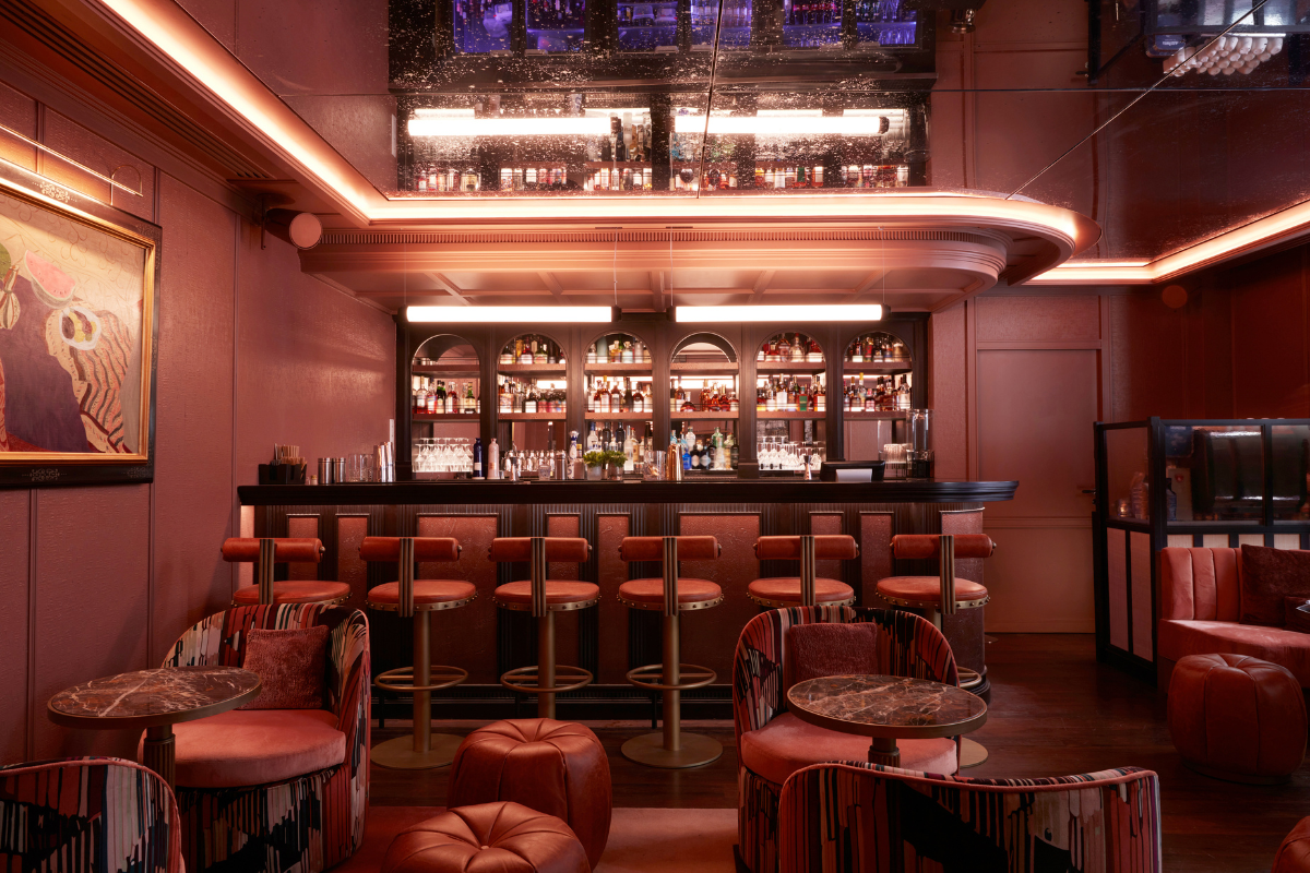 a bar with chairs and tables