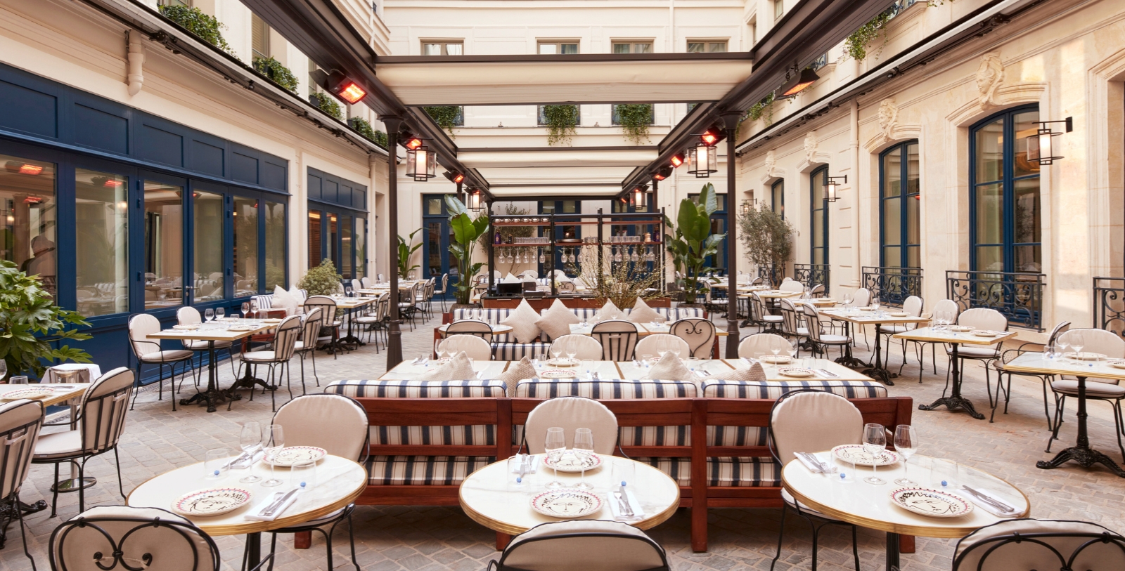 a restaurant with tables and chairs