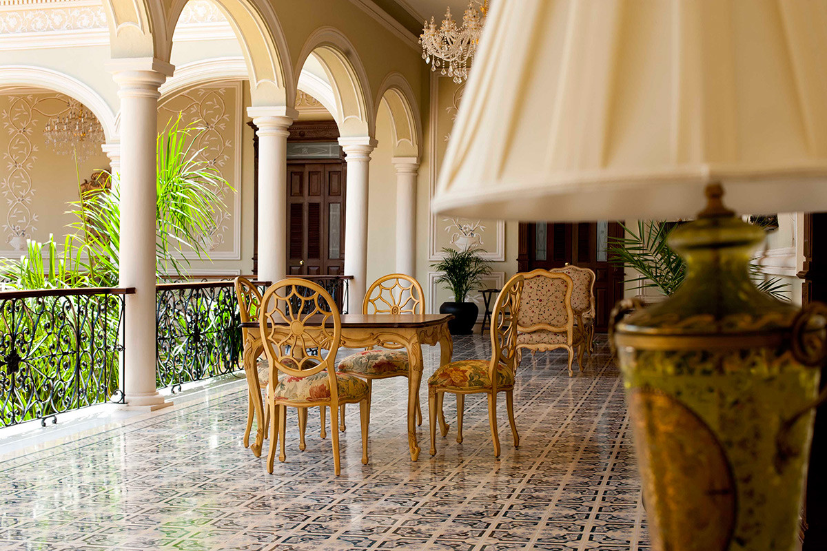 a room with a table and chairs
