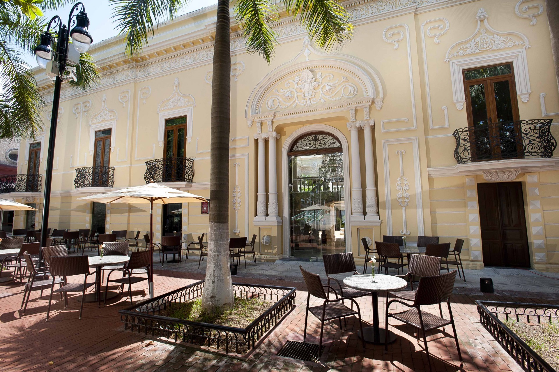 a building with tables and chairs outside