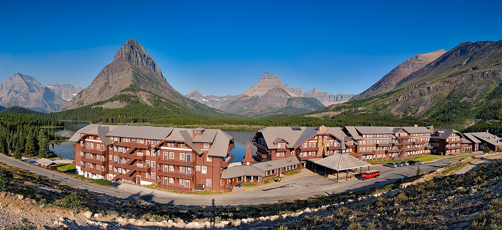 a large building next to Glacier National Park