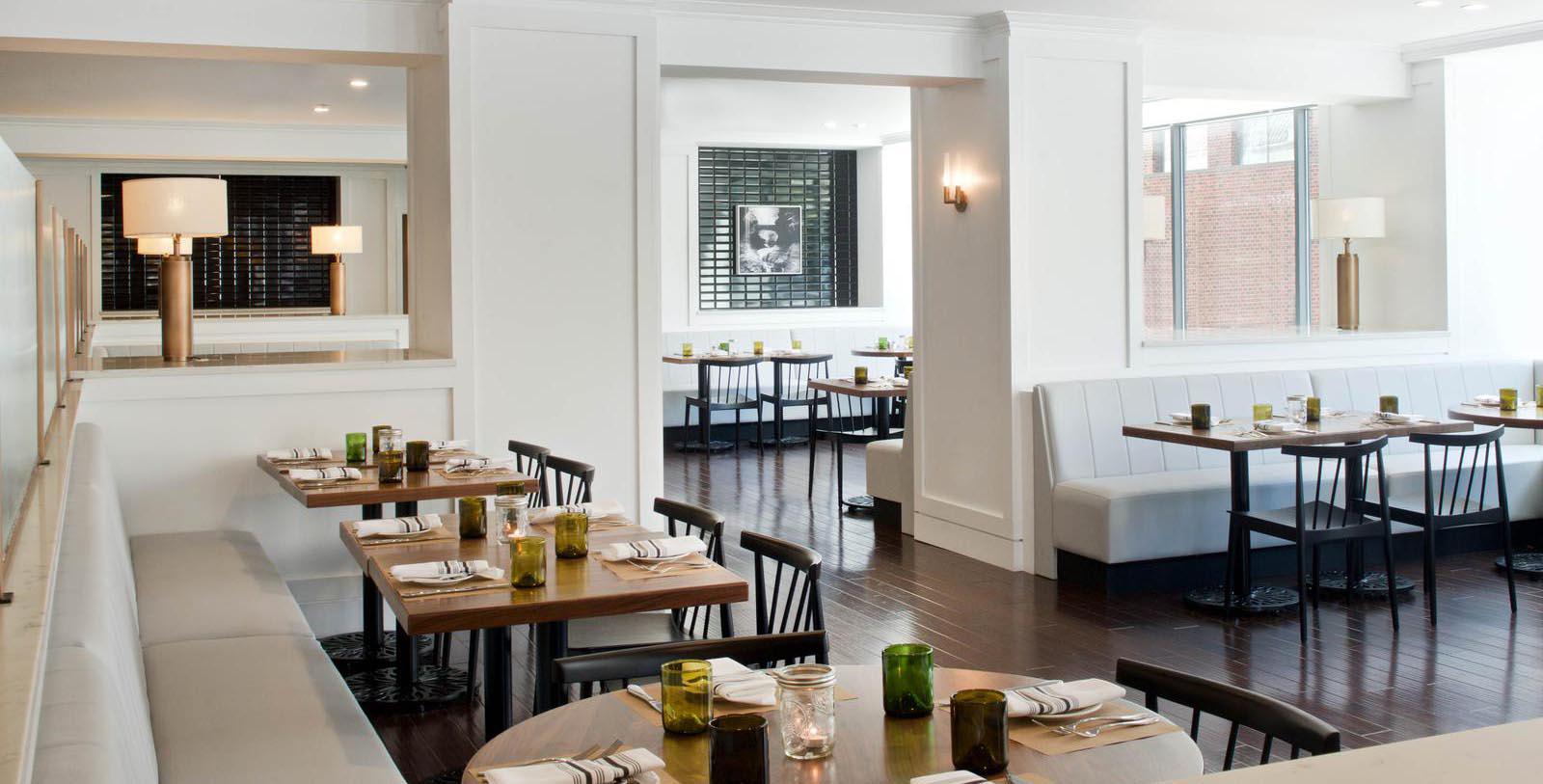 a restaurant with tables and chairs