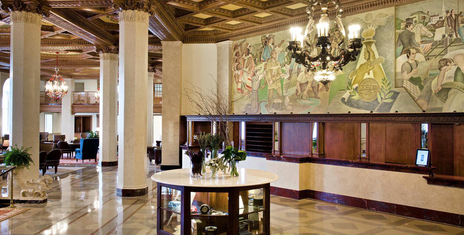 a room with a large mural on the wall