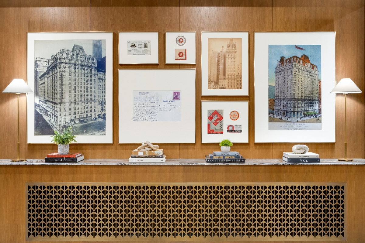 a wall with pictures and books