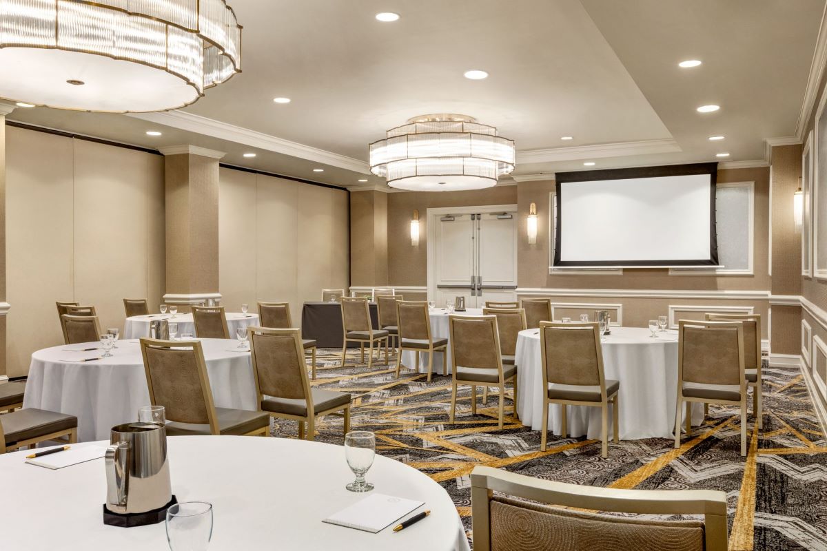 a room with tables and chairs