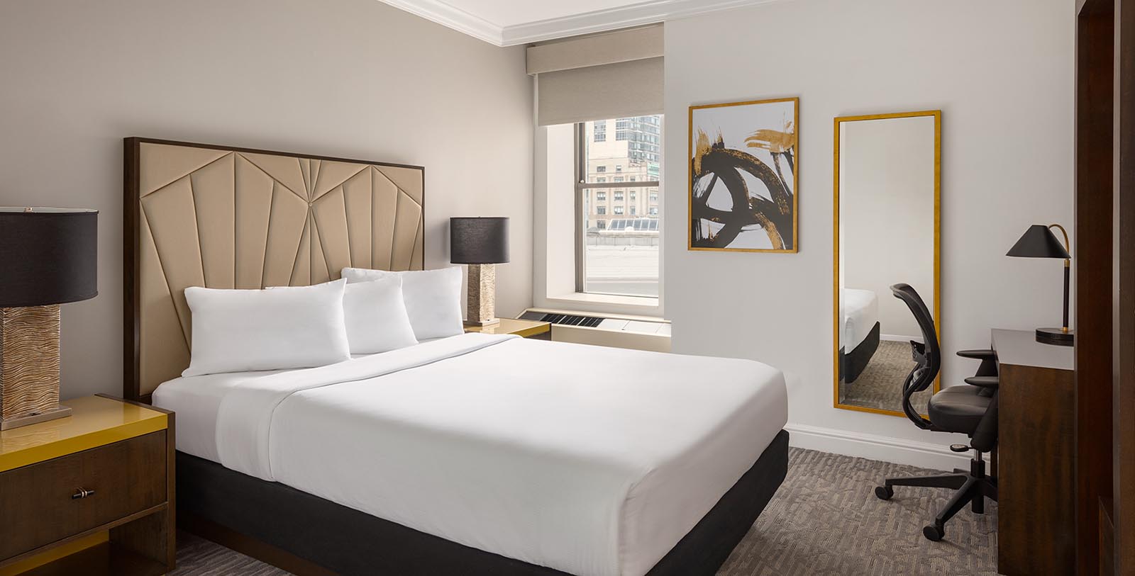 a bed in a hotel room