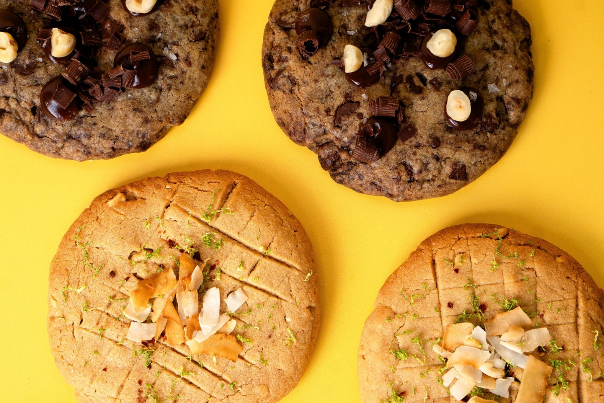 a group of cookies with nuts on them
