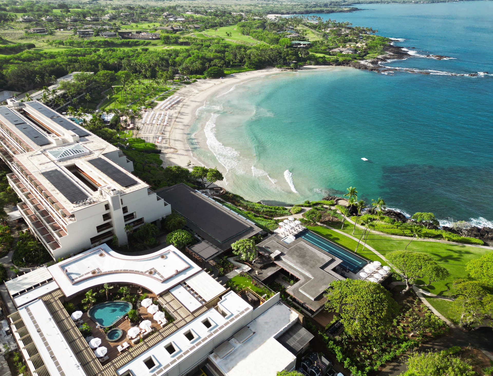 a aerial view of a beach and buildings