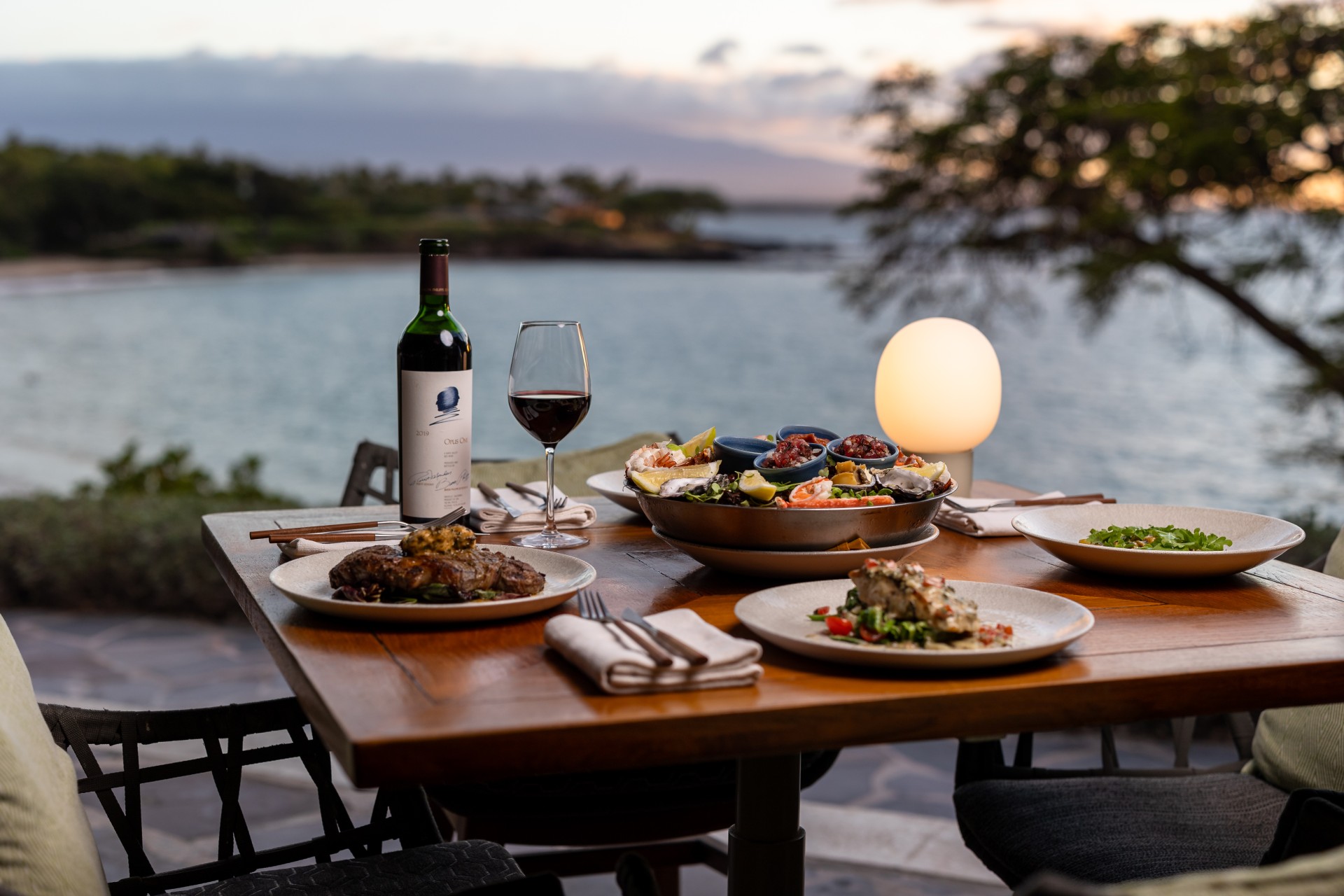 a table with food and wine on it