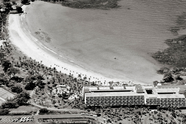 an aerial view of a beach and a hotel