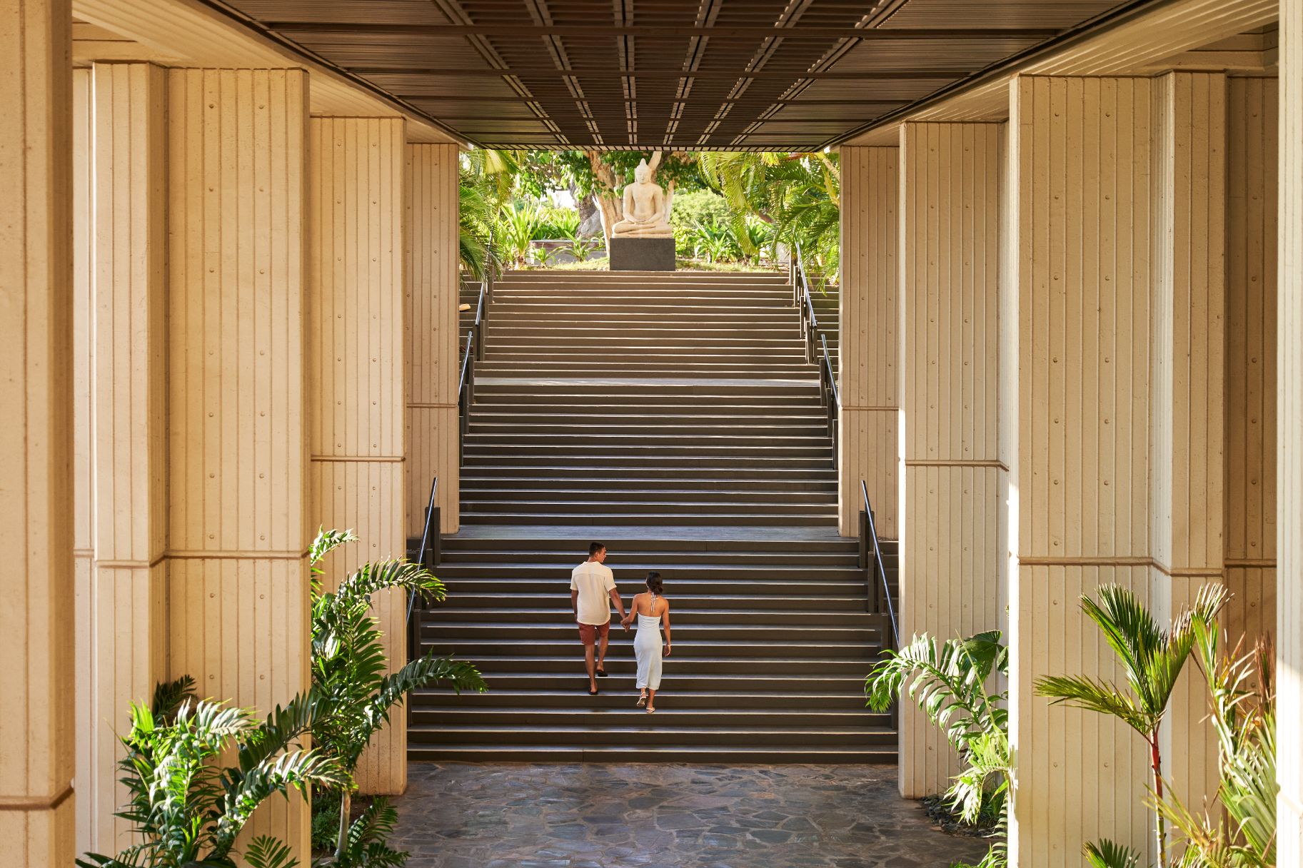 a couple walking up stairs