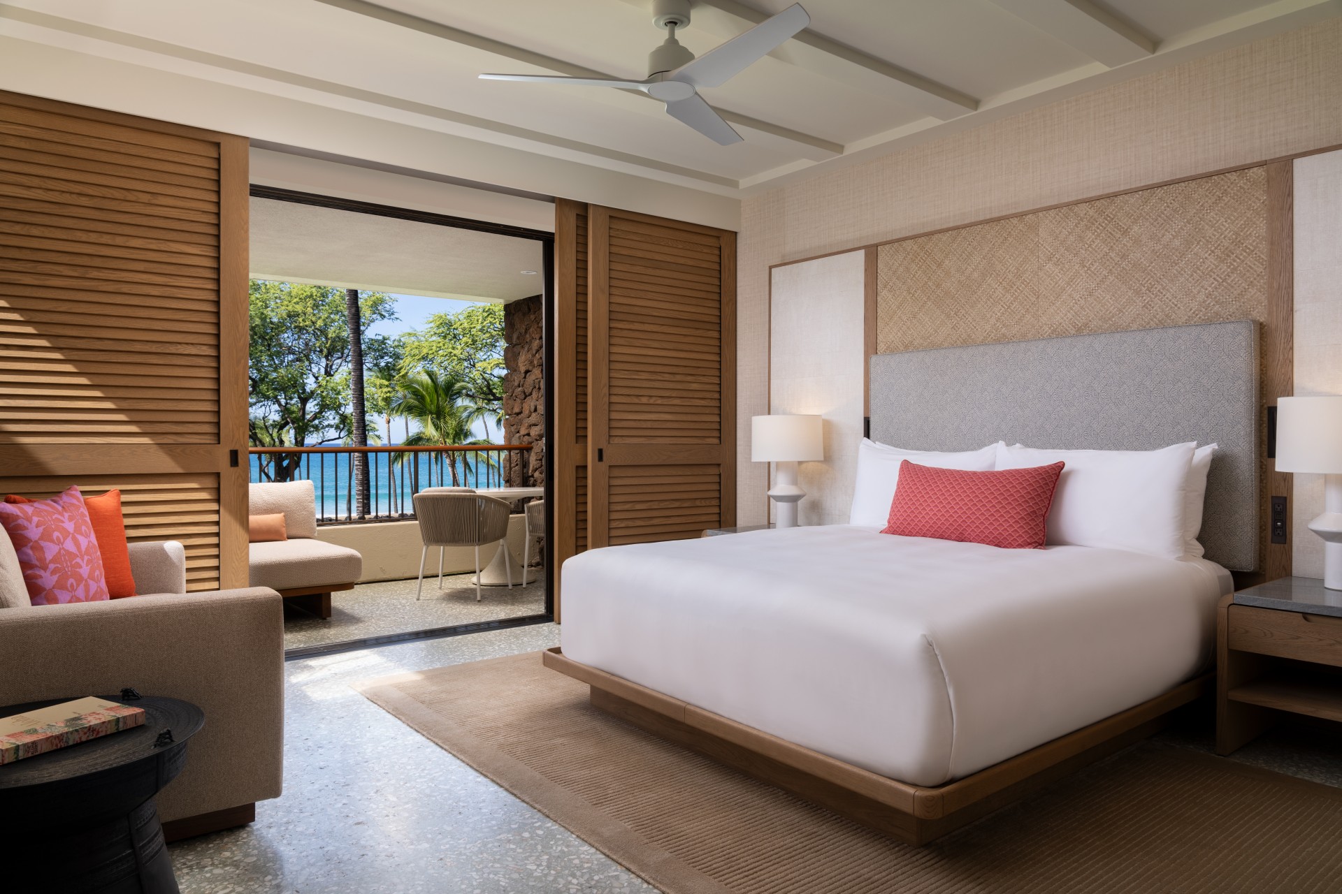 a bedroom with a bed and a ceiling fan