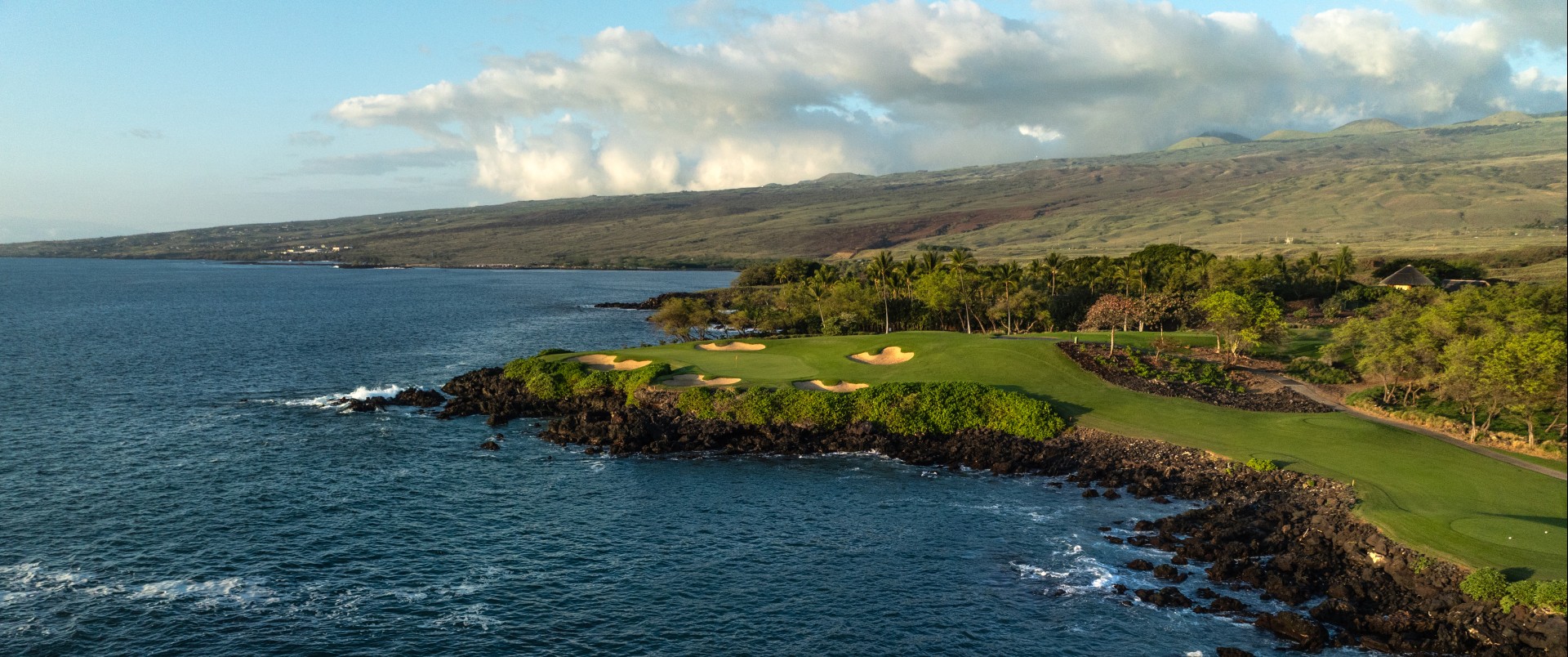 a golf course on a rocky island