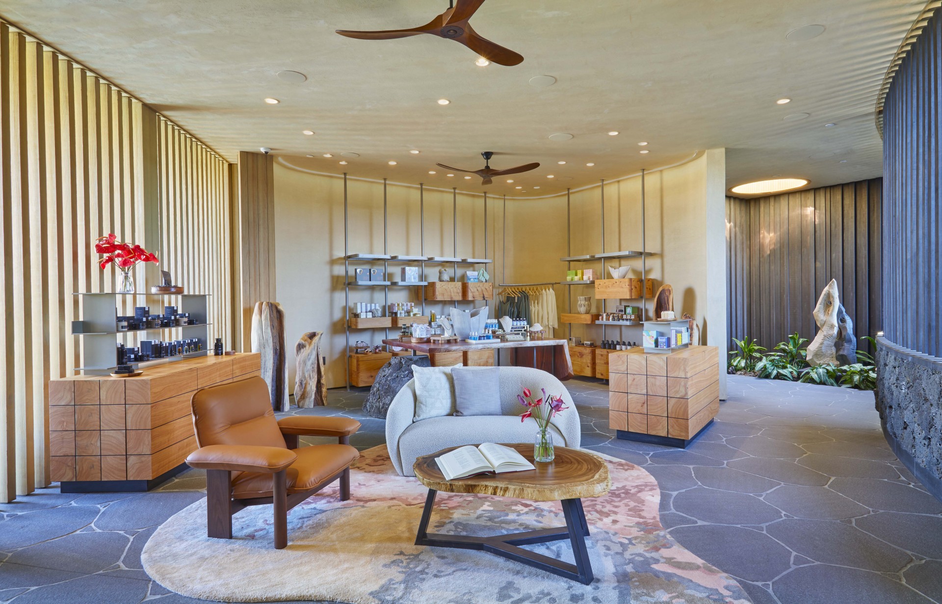 a room with a fan and furniture