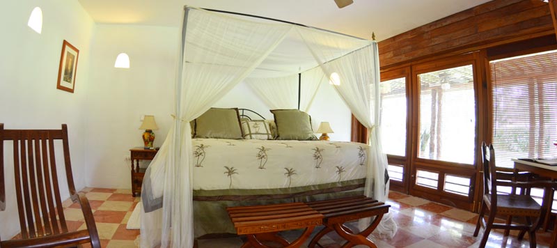 a bed with a canopy over it