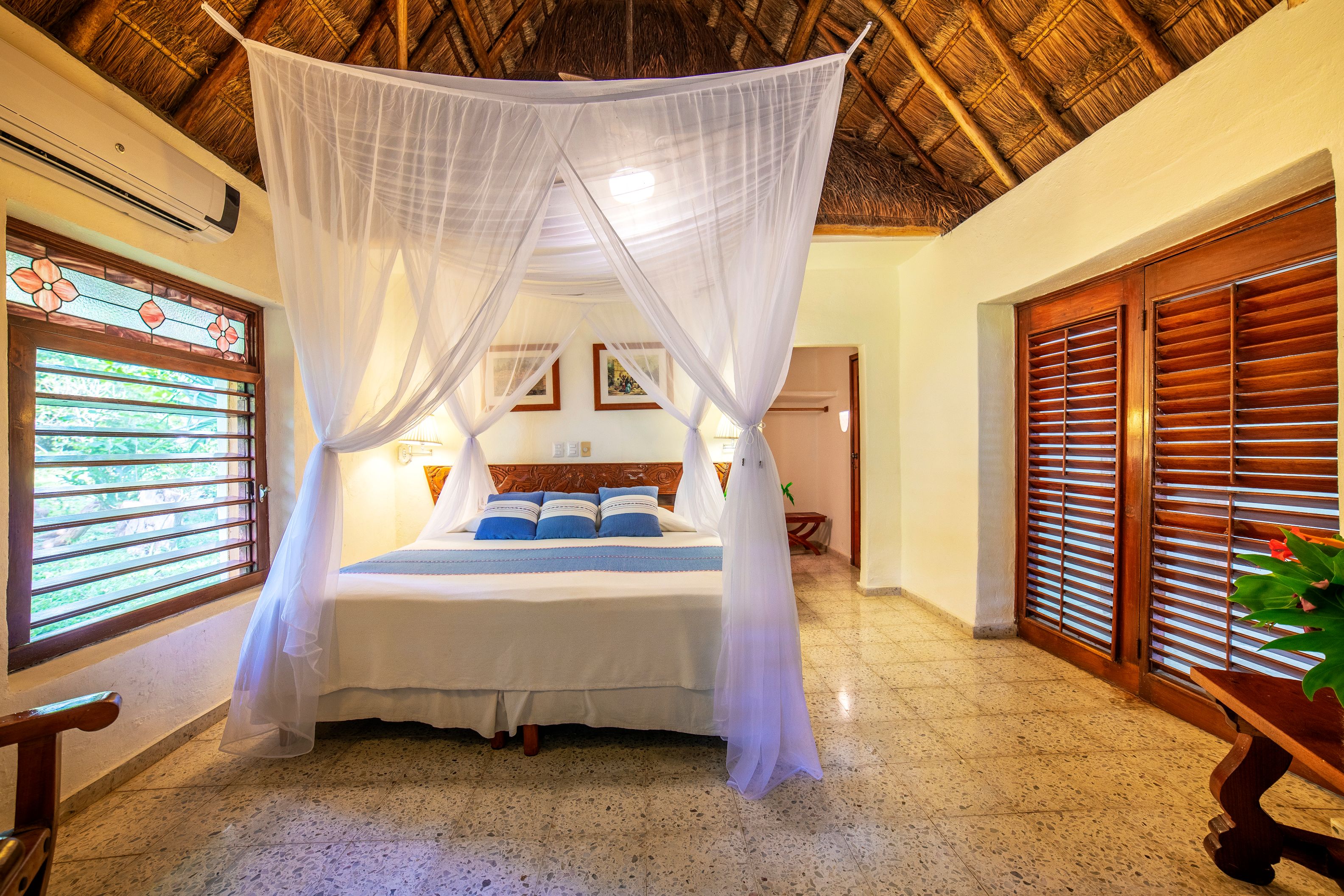 a bed with a canopy over it