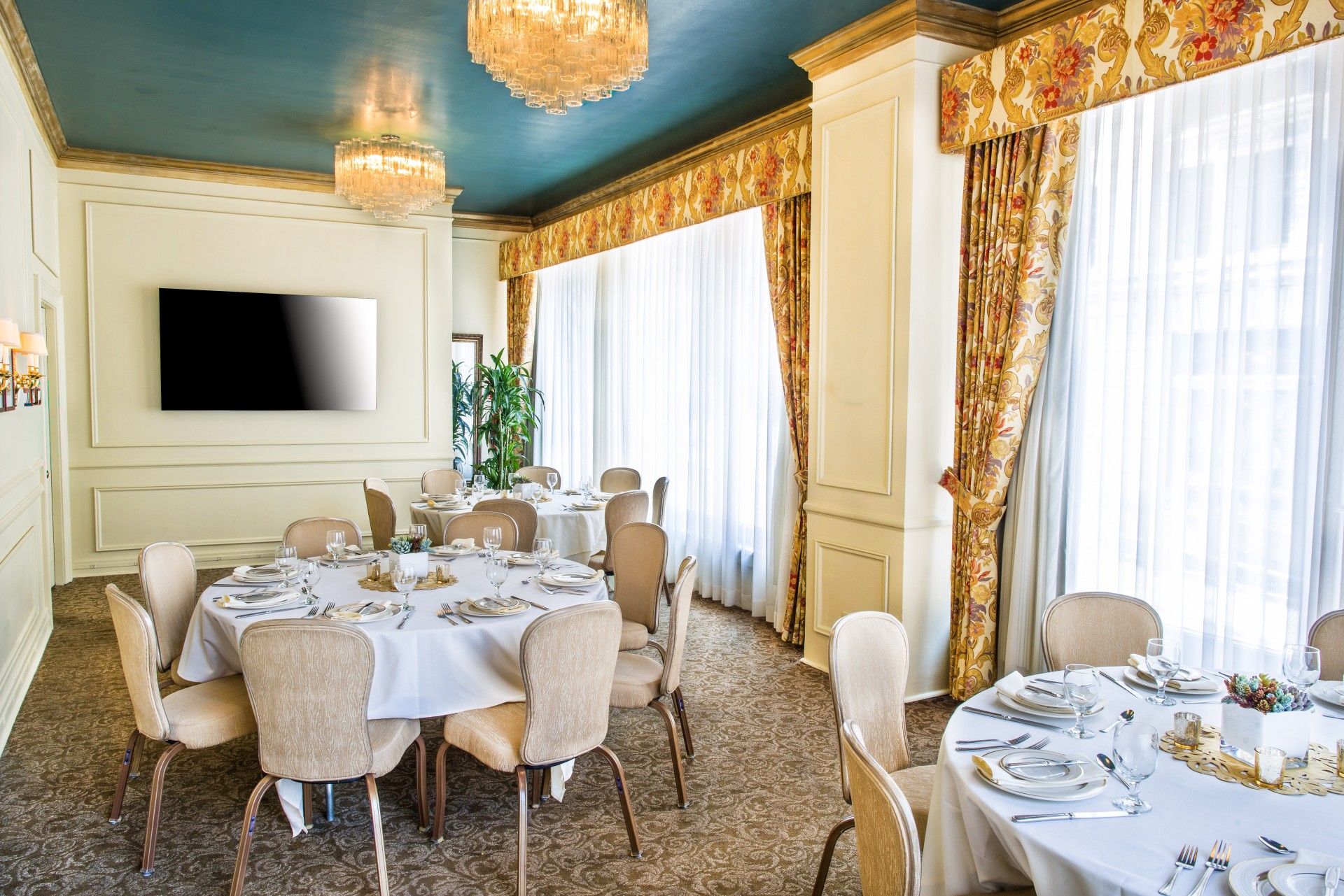 a room with tables and chairs
